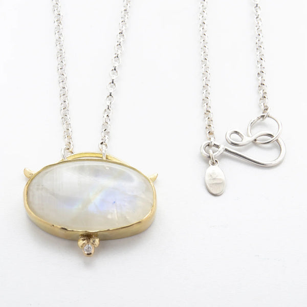 A Rainbow Moonstone Diamond Pendant Necklace finds A Home in Glasgow